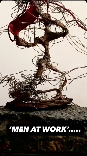 Men at Work — standing wire and timber sculpture